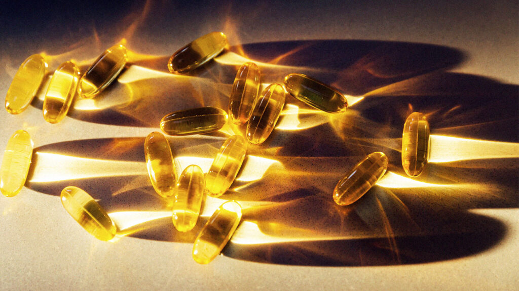 Vitamine D-capsules in zonlicht